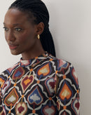 Blusa Gola Alta de Tule - Anturio Wallpaper